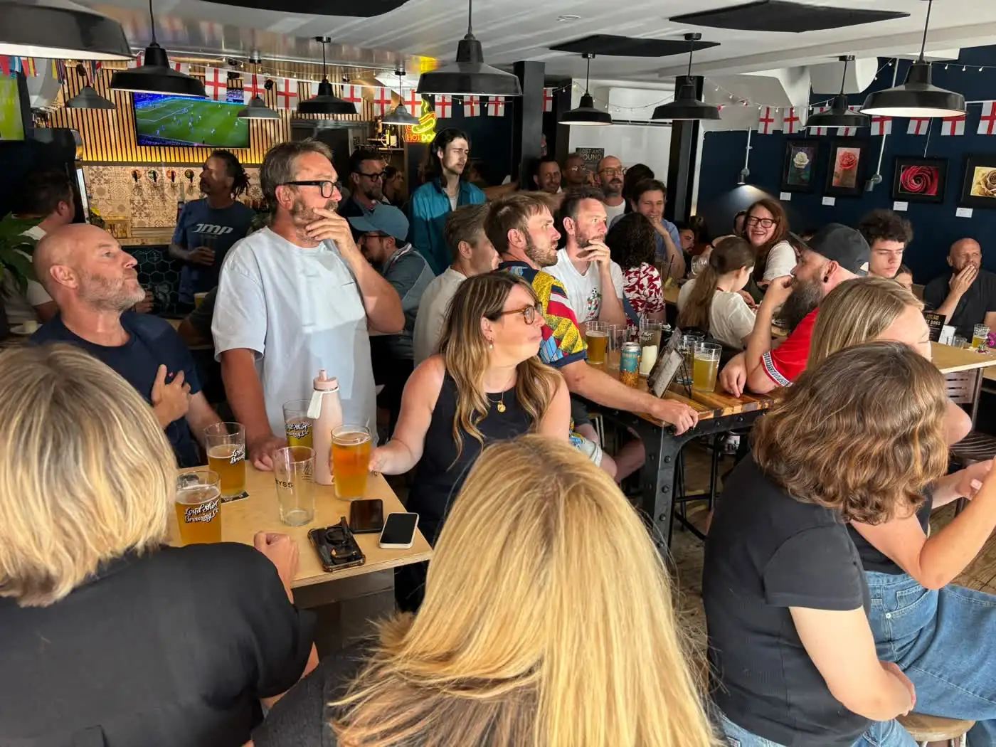 Regulars round a table at Lost And Found