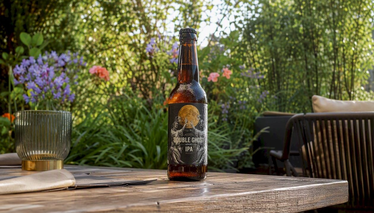 Chilled Adnams Double Ghost IPA bottle on kitchen counter